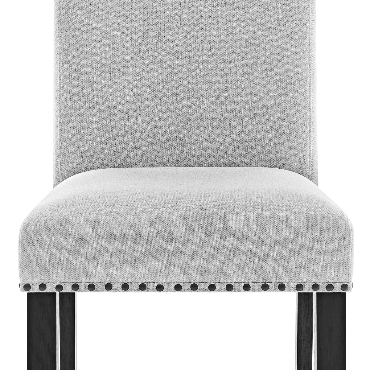 Upholstery and nailhead detail on the Varley Dove dining chair