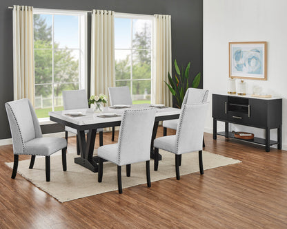 Varley rectangular table shown with mixed dining chairs, sold separately