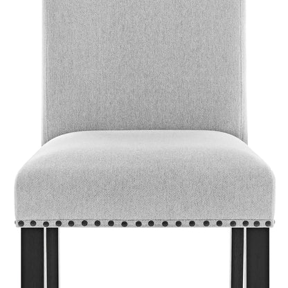 Upholstery and nailhead detail on the Varley Dove dining chair